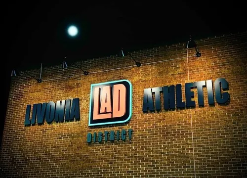 The LAD sign on the brick wall inside the facility